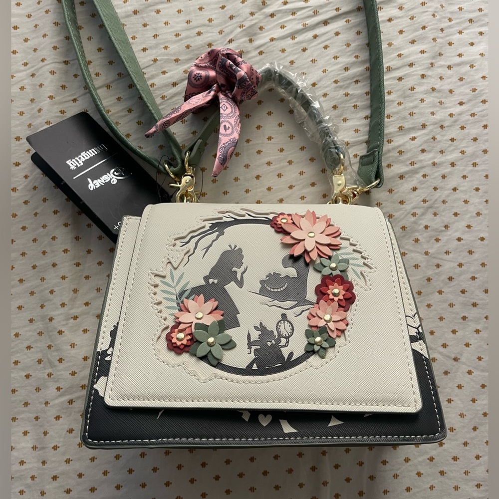 Disney Alice and wonderland loungefly purse.